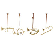 Arany minihangszerek alsó nézetben – fényes fém felület és bőrszíjak.