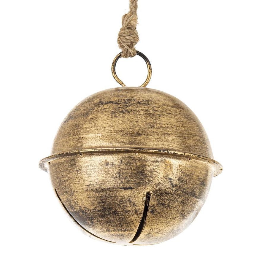 Antikolt felületű fém csengő – részletfotó, vintage textúra.