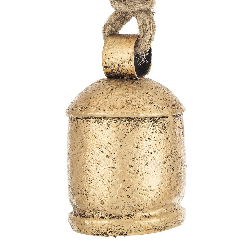 Aranyszínű karácsonyi fémharang részletfotó – texturált, patinás felület közelről