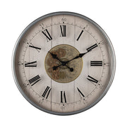 Vintage stílusú, antikolt fehér színű falióra láthathó mechanikus szerkezettel.