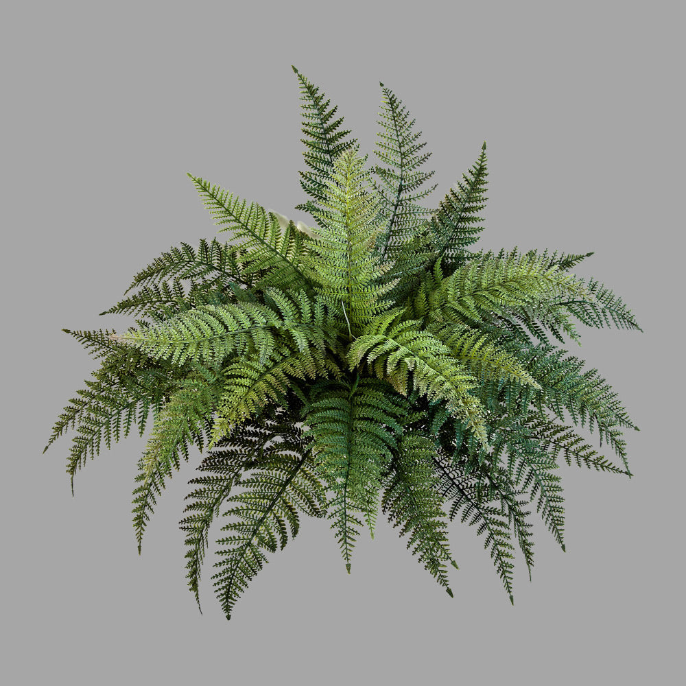 mű páfrány dekoráció változó árnyalatú levelekkel semleges szürke háttérrel