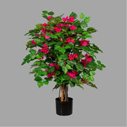 UV-álló, dús lombozatú, mesterséges murvafürt cserje fekete színű, műanyag kaspóban.