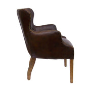 Vintage stílusú, dohánybarna színű, bőrrel kárpitozott bőr karosszék.