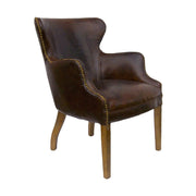 Vintage stílusú, dohánybarna színű, bőrrel kárpitozott bőr karosszék.