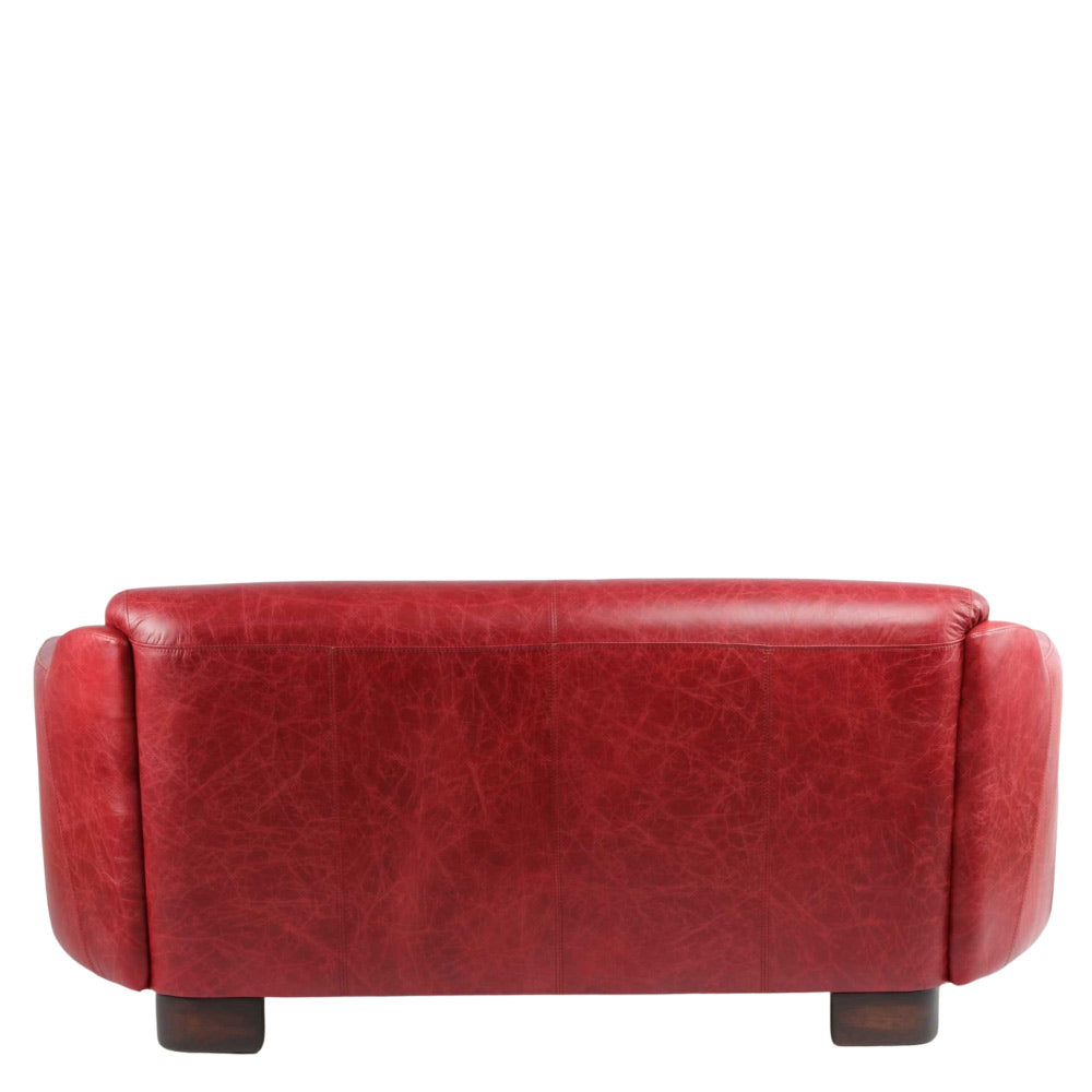 Vintage stílusú, vörös színű, valódi bőrrel kárpitozott kanapé. 