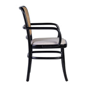 Koloniál stílusú, fekete színű, teakfa étkezőszék rattan háttámlával és bézs ülőfelülettel.