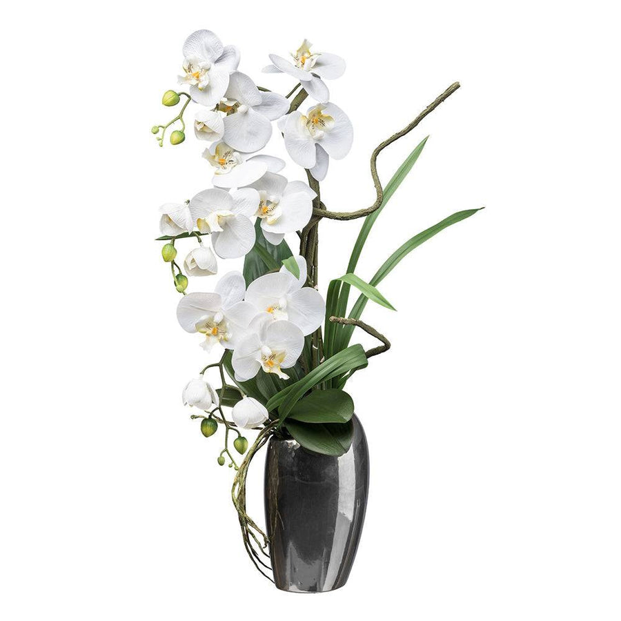 Fehér mű orchidea kompozíció ezüstszürke kaspóban, 68 cm magas.