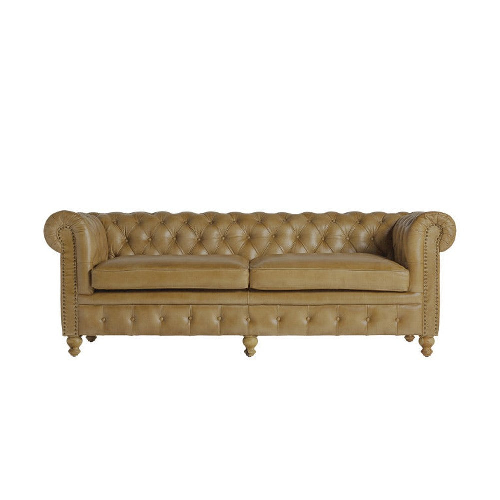Vintage stílusú, fenyőfa szerkezetű, barna színű bőrrel kárpitozott Chesterfield kanapé.