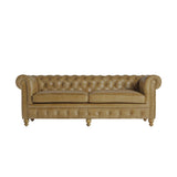 Vintage stílusú, fenyőfa szerkezetű, barna színű bőrrel kárpitozott Chesterfield kanapé.