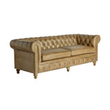 Vintage stílusú, fenyőfa szerkezetű, barna színű bőrrel kárpitozott Chesterfield kanapé.