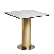 Art deco ihletésű, aranyszínű, fém bárasztal, fehér színű műmárvány fedlappal.