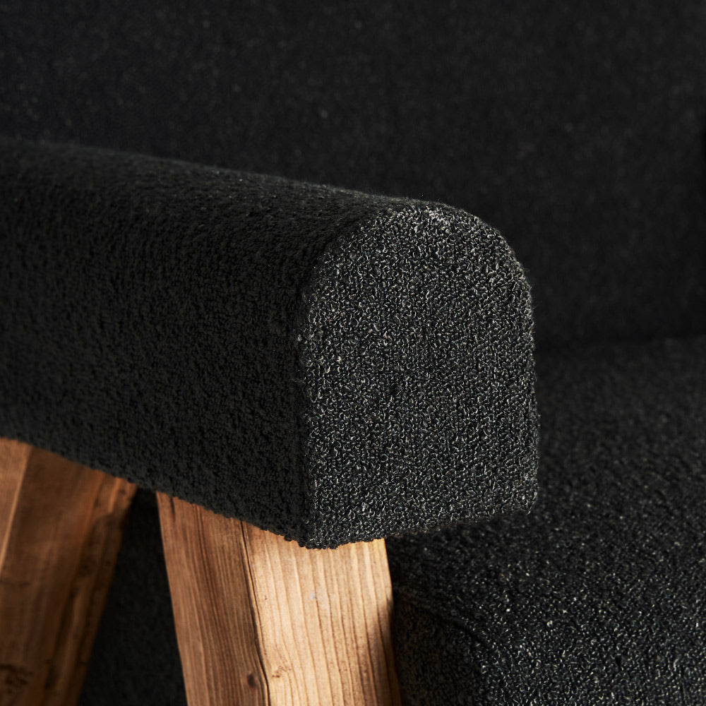 Kortárs stílusú, fenyőfából készült, fekete színű, buklé hatású szövettel kárpitozott fotel
