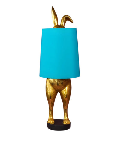Aranyszínű, nyuszi formájú, glamour stílusú díjnyertes asztali lámpa kék búrával.