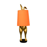 Aranyszínű, nyuszi figurás, glamour stílusú, asztali lámpa.