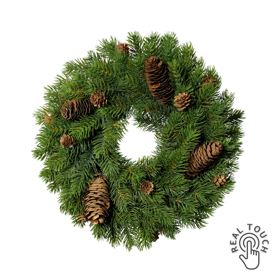 Zöld színű, mű jegenyefenyő koszorú.