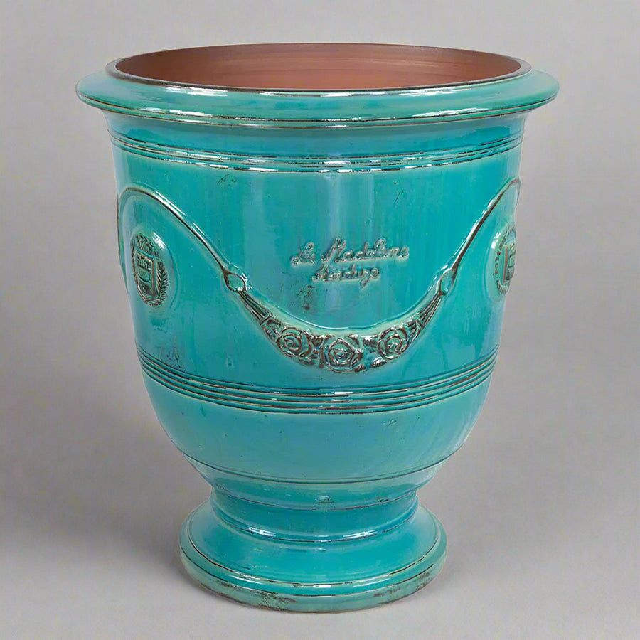 Türkizkék színű, anduze kerámiakaspó.