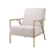 Bézs szövet design fotel arany színű, ágszerű öntöttvas vázzal, elölnézeti kép.