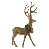Arannyal antikolt szarvas hátulnézetben, látványos agancsokkal