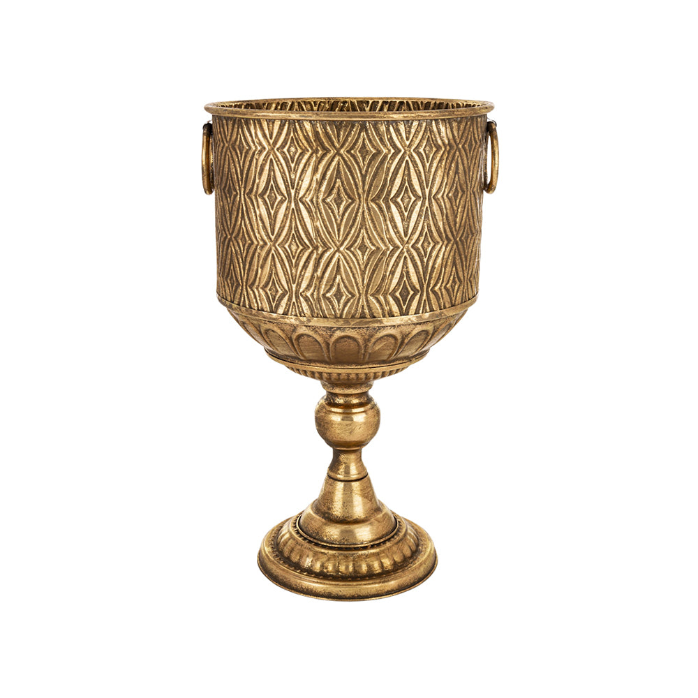 Antique Metals kaspó oldalnézetből, antik aranyszínű fém felülettel és dekoratív fémgyűrűs fogantyúval, klasszikus talapzattal.
