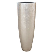 Karcsú, matt világos pezsgő színű BAQ kaspó, enyhe szögből fotózva, fehér háttérrel.