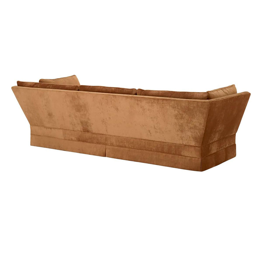 Rézszínű bársonyszövettel kárpitozott, modern stílusú exkluzív kanapé.