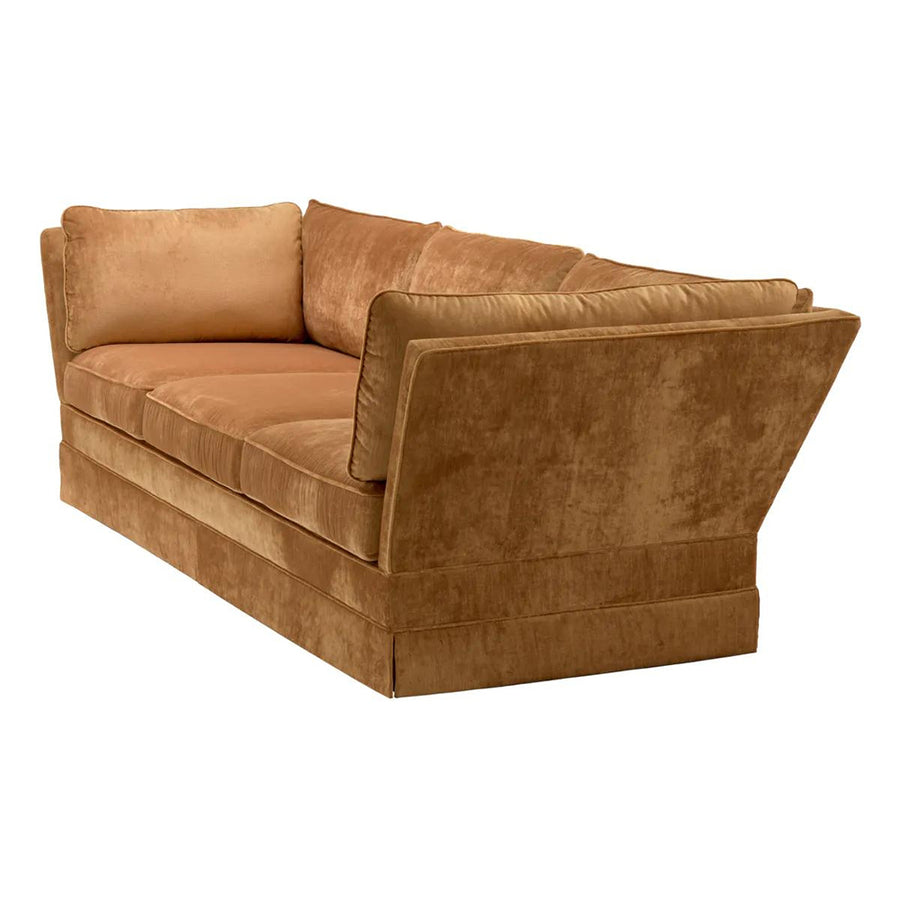 Rézszínű bársonyszövettel kárpitozott, modern stílusú exkluzív kanapé.