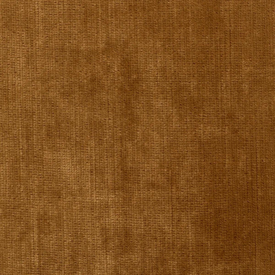 Rézszínű bársonyszövettel kárpitozott, modern stílusú exkluzív kanapé.