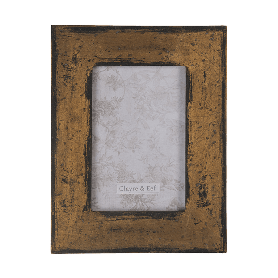 Antikolt felületű, barna színű asztali fényképtartó.