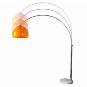 Íves, polírozott krómszínű fémből készült, narancssárga design állólámpa.