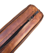 Teakfából készült, antikolt dohánybarna színű bőrrel kárpitozott, kézműves design fotel.