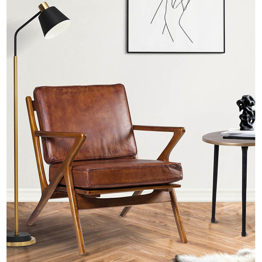 Teakfából készült, antikolt dohánybarna színű bőrrel kárpitozott, kézműves design fotel.