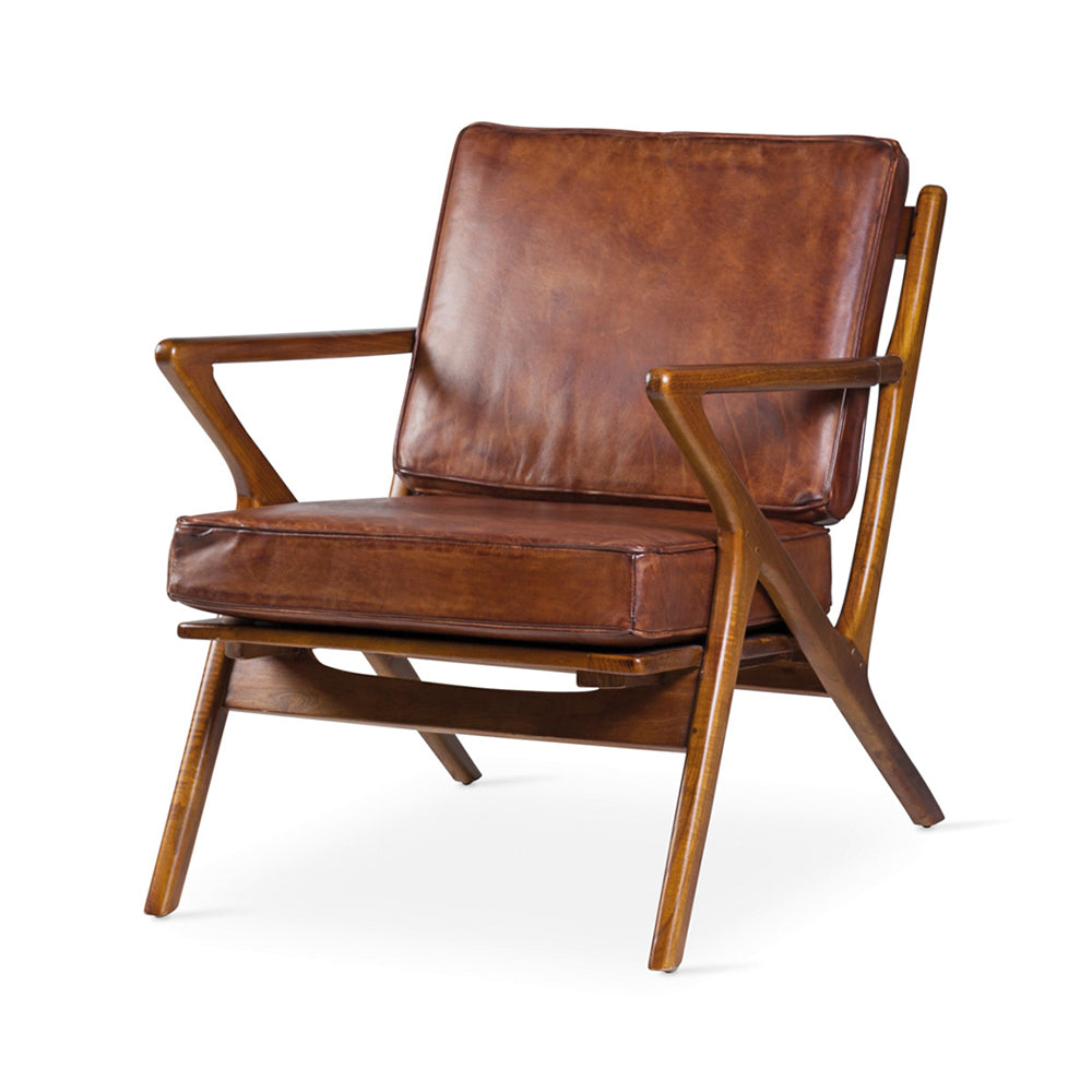 Teakfából készült, antikolt dohánybarna színű bőrrel kárpitozott, kézműves design fotel.