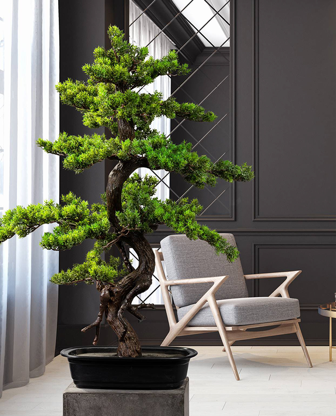 Zöld színű, mű mirtusz bonsai fa, fekete ovális műanyagkaspóban.