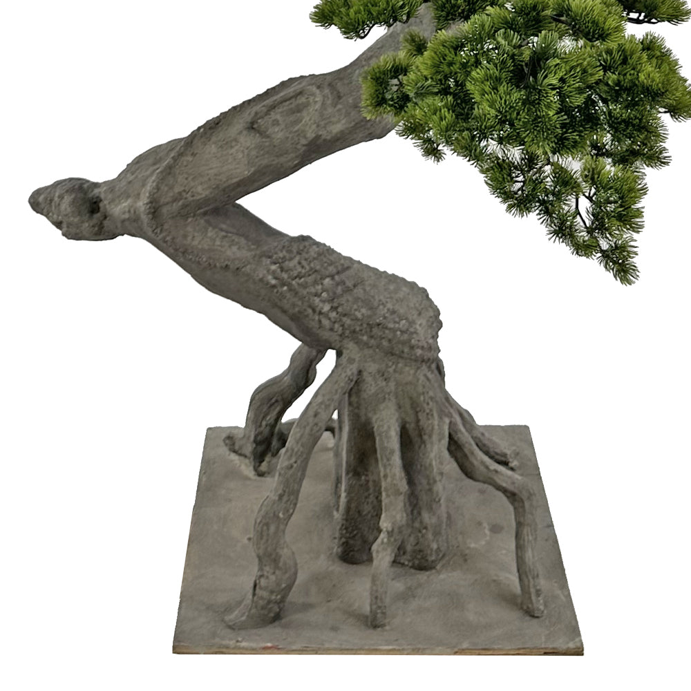 Zöld színű, mű fenyő bonsai fa.