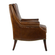 Dohánybarna színű bőrrel kárpitozott bőrfotel.