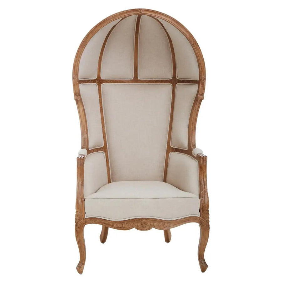 Koloniál stílusú, mindifa szerkezettel kialakított, krémszínű szövettel kárpitozott hintó fotel.