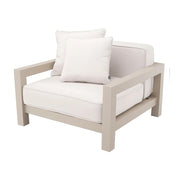 Bézs színű ülő és hátpárnákkal kialakított, formatervezett kerti design fotel.