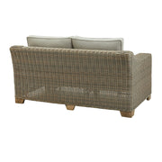 2 személyes, bézs színű műrattan kerti kanapé.