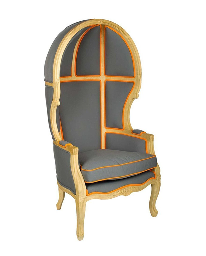 Szürke és narancssárga színű szövettel kárpitozott, kortárs stílusú design hintófotel.