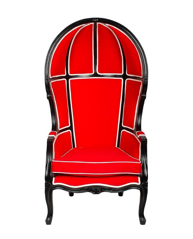 Piros színű szövettel kárpitozott, kortárs stílusú design hintófotel.