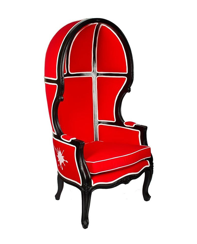 Piros színű szövettel kárpitozott, kortárs stílusú design hintófotel.