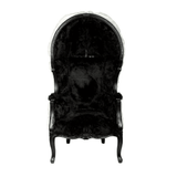 Fekete és fehér színű műszőrmével kárpitozott, kortárs stílusú design hintófotel.