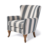 Kék és fehér csíkos szövettel kárpitozott, kézműves füles fotel.