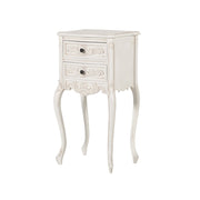 Törtfehér színű, gazdagon díszített, 2 fiókos kézműves éjjeliszekrény.