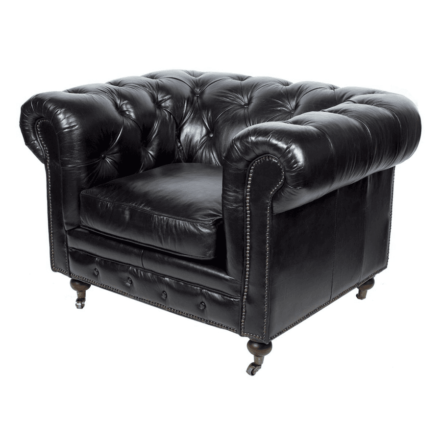 Fekete bőrfotel hátsó nézetből, klasszikus Chesterfield vonalvezetéssel.