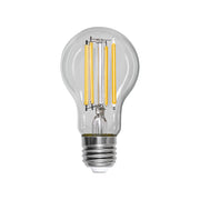 Clear LED izzó E27-es foglalattal, A60-as formában, négy darab sárga filament szállal, kikapcsolt állapotban, víztiszta üveg búrával.