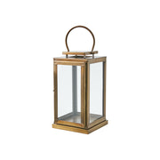 Modern, kortárs stílusú, rozsdamenetes acélból készült, sárgarézszínű lámpás.