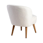 Hátsó nézet – CLUB EMMA bézs bouclé fotel, kaucsukfa lábakkal.