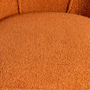 Háttámla varrásainak részlete a hurkolt szövet felületén.