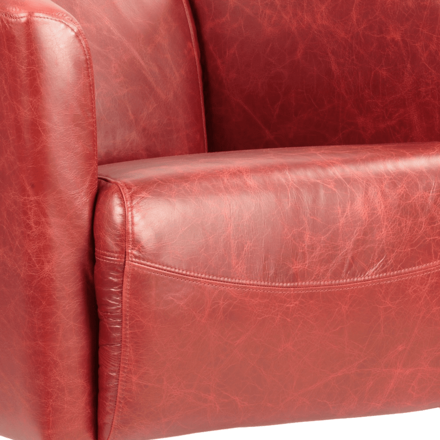 Piros színű valódi marhabőrrel kárpitozott kis méretű klubfotel.